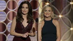 BEVERLY HILLS, CA - JANUARY 12:  In this handout photo provided by NBCUniversal,  Hosts Tina Fey and Amy Poehler speak onstage during the 71st Annual Golden Globe Award at The Beverly Hilton Hotel on January 12, 2014 in Beverly Hills, California.  (Photo by Paul Drinkwater/NBCUniversal via Getty Images)