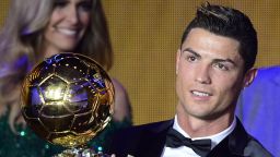 Real Madrid's Portuguese forward Cristiano Ronaldo receives the 2013 FIFA Ballon d'Or award for player of the year during the FIFA Ballon d'Or award ceremony at the Kongresshaus in Zurich on January 13, 2014. AFP PHOTO / OLIVIER MORIN (Photo credit should read OLIVIER MORIN/AFP/Getty Images)