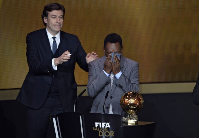 Brazilian legend Pele cries as he is handed an honorary FIFA Ballon d'Or, with the three-time World Cup winner having been ineligible to win the award during his playing days because he did not play in Europe. 