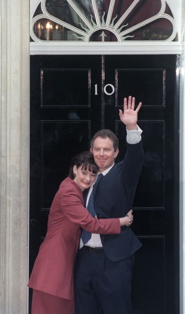 Blair hugs her husband outside 10 Downing Street on May 2, 1997 following the Labour Party's victory in the country's general election. But Blair tells CNN that when she met a young Tony Blair while training to be a lawyer, he didn't leave a good impression. "I thought he's just another one of these public school boys but then we worked together and ... he made a different impression on me."