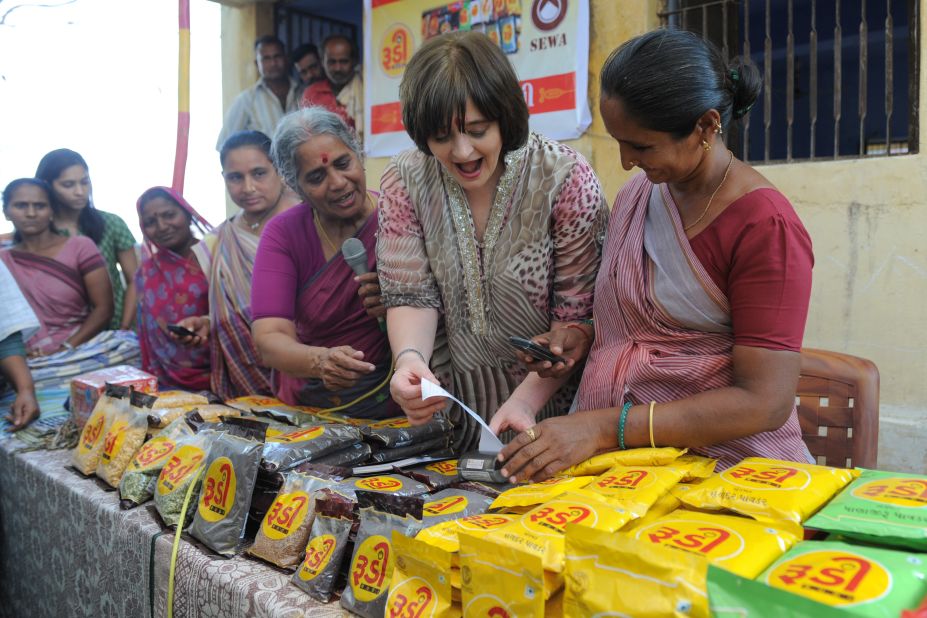 In 2008, she established the Cherie Blair Foundation for Women aimed at providing education and financial aid to female entrepreneurs internationally. With projects in Ghana, Tanzania and Rwanda, the foundation continues to empower local women with the necessary tools to enhance their businesses. Here Blair visits a women's initiative center in India in March 2013. 