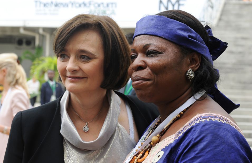 Cherie Blair poses with president of the NGO 'Fondation Espoir et Vie' Pauline Lambou Ngouanfou during the New York Forum Africa in Libreville on June 15, 2013. The forum, dedicated to the economic development of Africa, brings together nearly 700 economic policymakers.