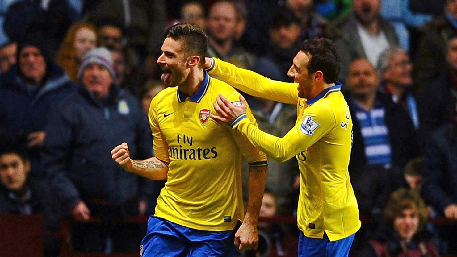 Olivier Giroud celebrates the goal that took Arsenal back to the top of the English Premier League. 