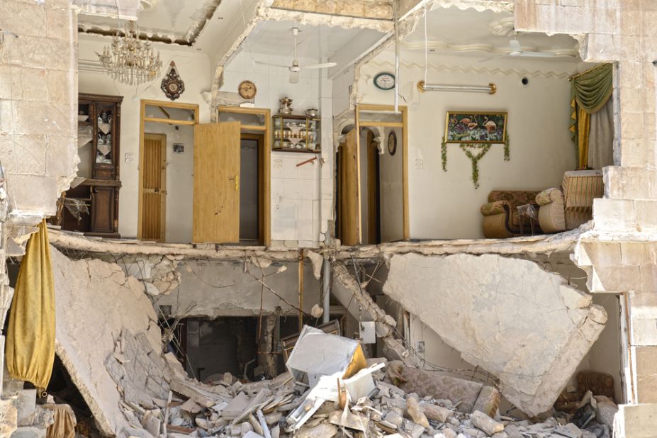 This picture shows the remains of a Free Syrian Army commander's home. "The living room was literally sliced in half," he said. 