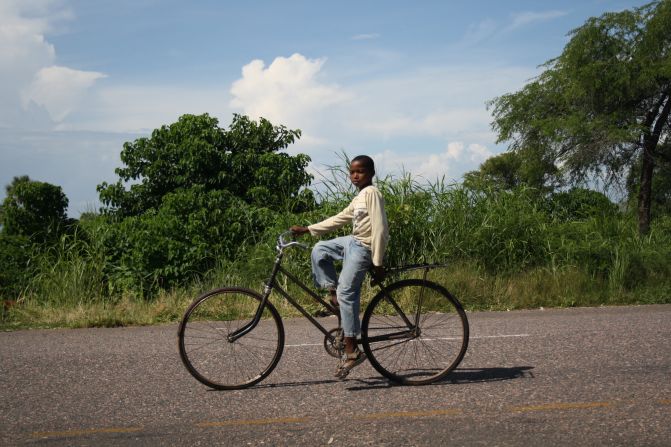 A boy in Malawi takes a more laid back approach than the Tour cyclists ... 