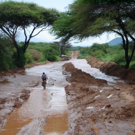 Desert heat isn't the only climatic challenge. Roads become mud baths during Tanzania's rainy season.(Pictured, 2013 Tour)