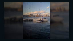 Phone photo of U.S. Airways flight 1549 in the Hudson River on January 15, 2009 posted to Twitter.