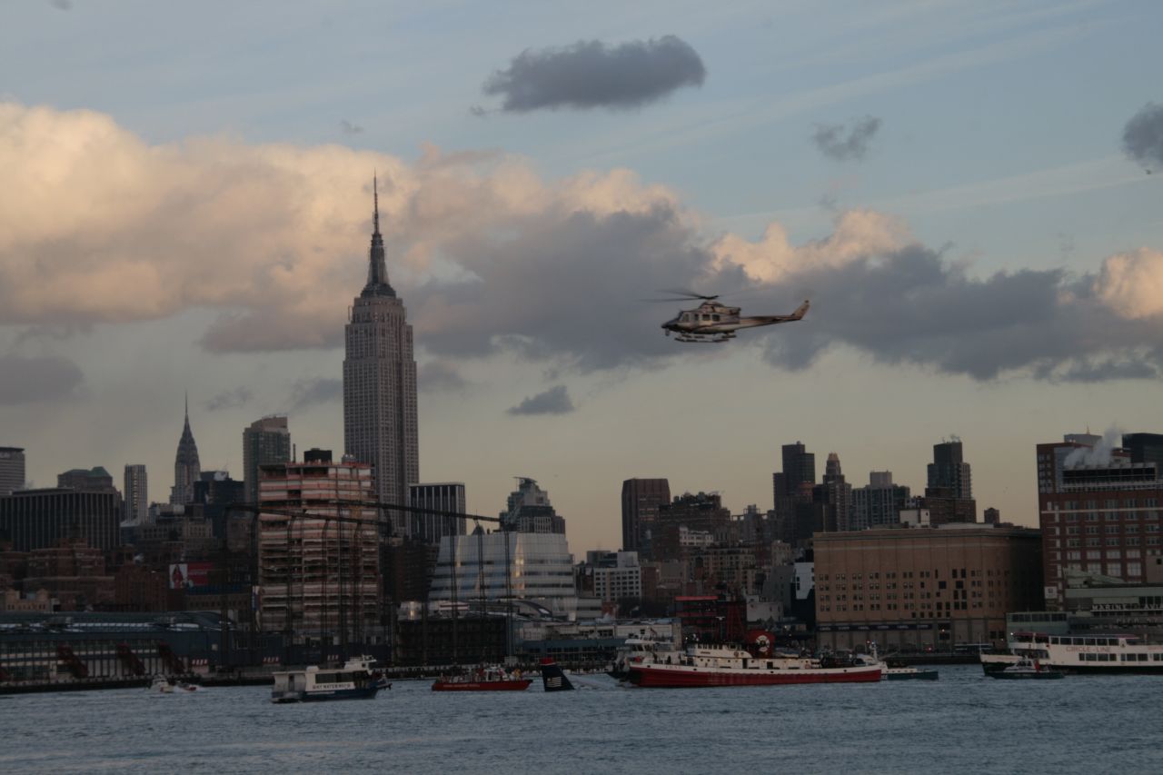 Jim Davidson of Hoboken, New Jersey, said the scene looked "pretty well organized" from what <a href="http://ireport.cnn.com/docs/DOC-182001">he could see</a> across the river. He said ferry and tourist boats pulled up to the downed plane.