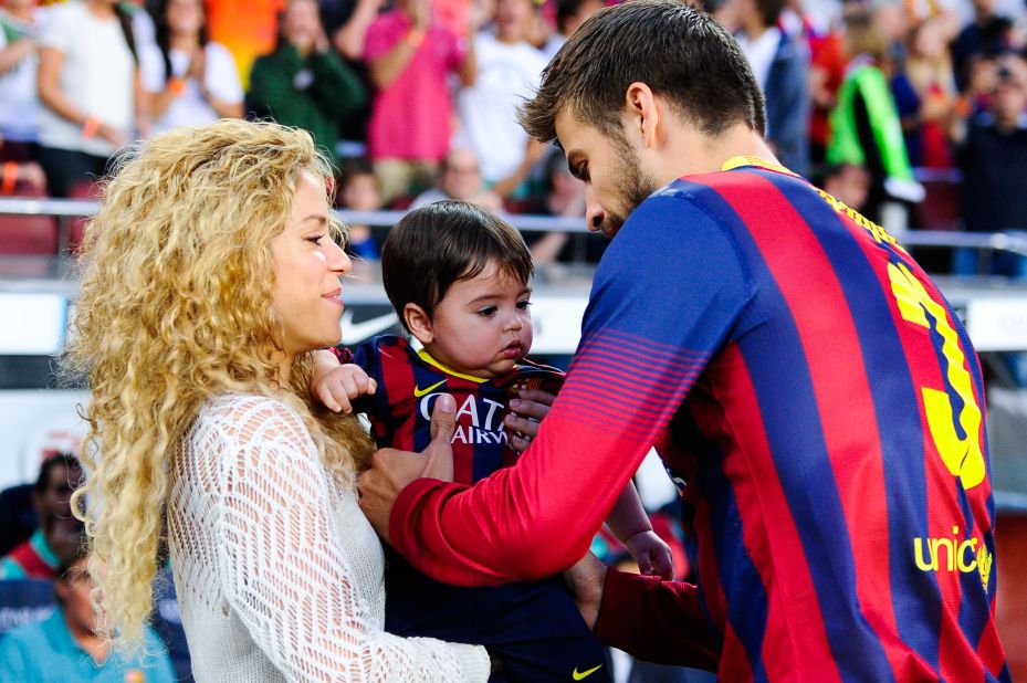 Shakira and Gerard Pique of FC Barcelona are seen with son Milan prior to the La Liga match in 2013. The famous parents live in Spain and are raising their two children, Milan and Sasha, to speak Spanish and English.