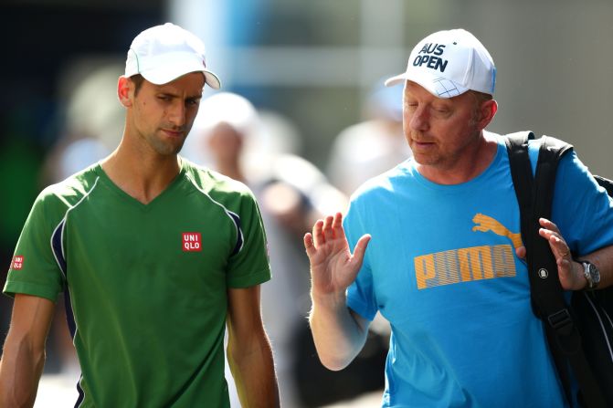Becker (right) in conversation with Djokovic at the 2014 Australian Open in Melbourne, where he lost in the quarterfinals. The 46-year-old German is one of several former grand slam champions to recently take up a coaching role with a top player. 