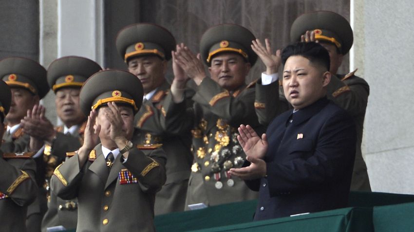 North Korean leader Kim Jong-Un (R) applauds with top military leaders during an official ceremony at a stadium in Pyongyang on April 14, 2012.