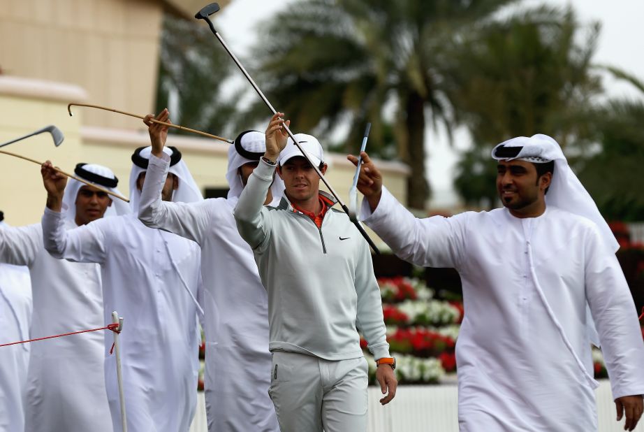 Rory McIlrory says he is feeling more relaxed ahead of the 2014 golf season and it shows as he joins in some local dancing ahead of the Abu Dhabi Golf Championship.