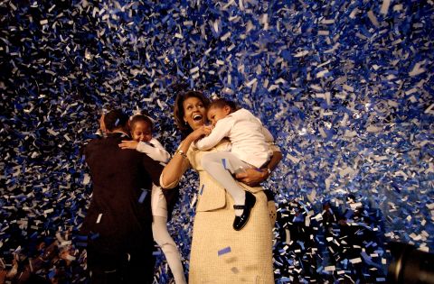 The Obamas celebrate during a victory party in Chicago on November 2, 2004.
