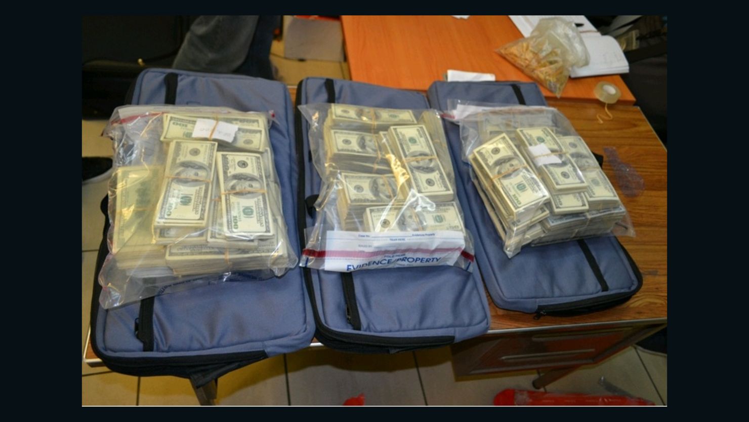 Police at a Panama airport find more than $7 million stashed inside suitcases on 11 January.