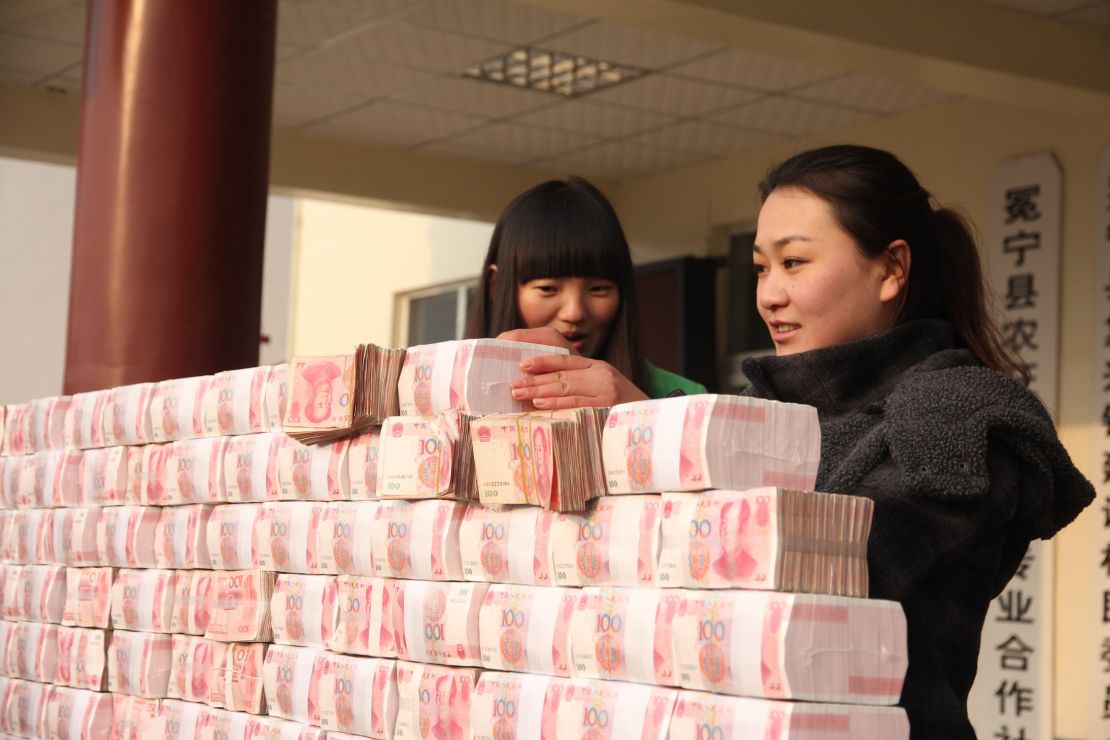 Building the 'money wall' in Jianshe village