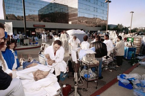 Medical personnel work a triage unit outside Sylmar's Olive View Medical Center to help some of the people injured in the earthquake.