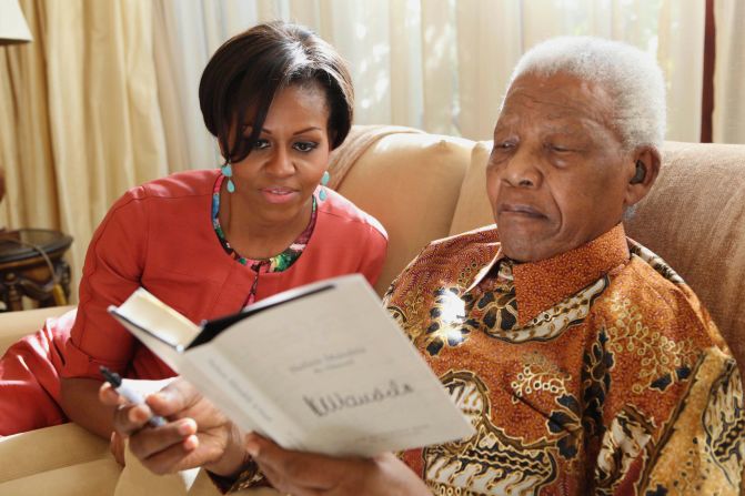 The first lady meets with former South African President Nelson Mandela in June 2011.