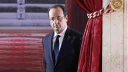 French President Francois Hollande arrives to deliver his speech at his annual news conference, Tuesday, Jan.14, 2014 at the Elysee Palace in Paris. The French president's complex personal life — and what it means to be the first lady in modern society — may get a full airing as Hollande answers questions for the first time since a tabloid reported he was having an affair with an actress. (AP Photo/Christophe Ena)