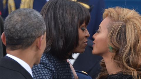Michelle Obama greets singer Beyonce at the president's 2013 inauguration.