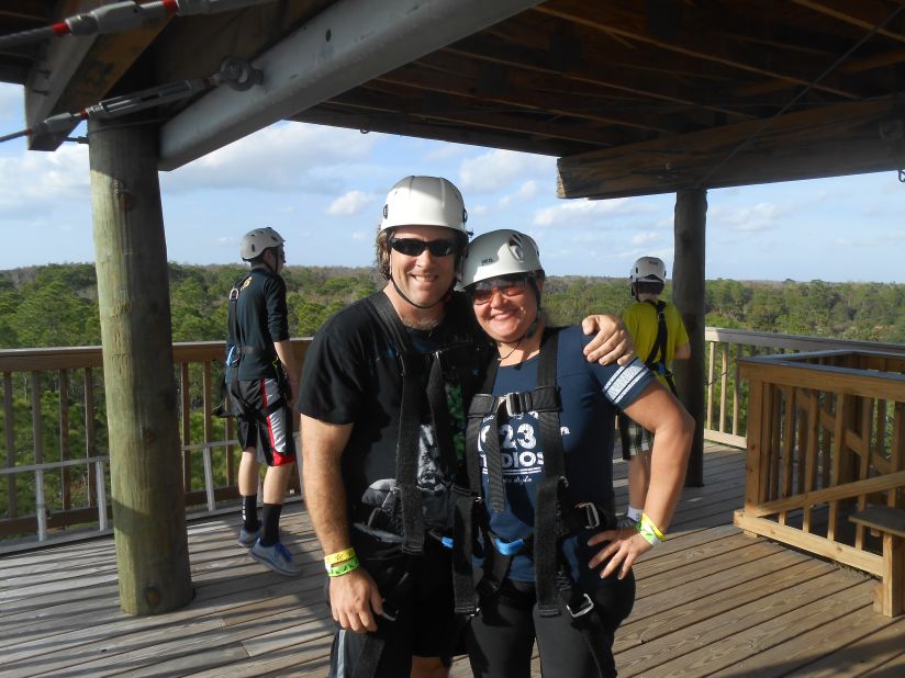 Gabi and David Rose ride a zip-line roller coaster in St. Cloud, Florida, to celebrate their weight loss. 