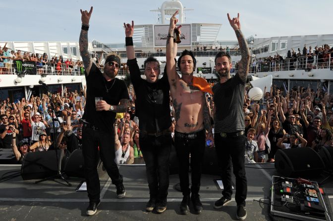 Members of the band, Lit, are photographed on stage at "Shiprocked" in 2012. Concert cruises have become increasingly popular in recent years. Performers such as Kid Rock and New Kids on the Block have also set up their own voyages.