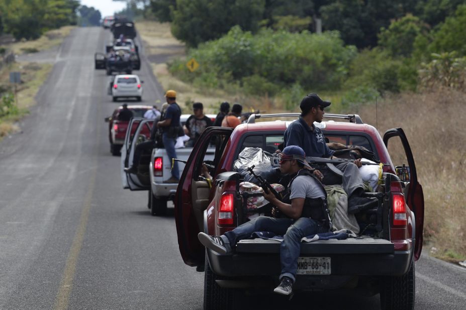 Self-defense groups head to the village of Nueva Italia in Michoacan state on Tuesday, January 14, to face the Knights Templar cartel.