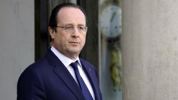 French President Francois Hollande waits to meet with Abu Dhabi Crown Prince prior to talks expected to touch on Syria, a week before a major peace conference opens, at the Elysee palace in Paris on January 16, 2014.