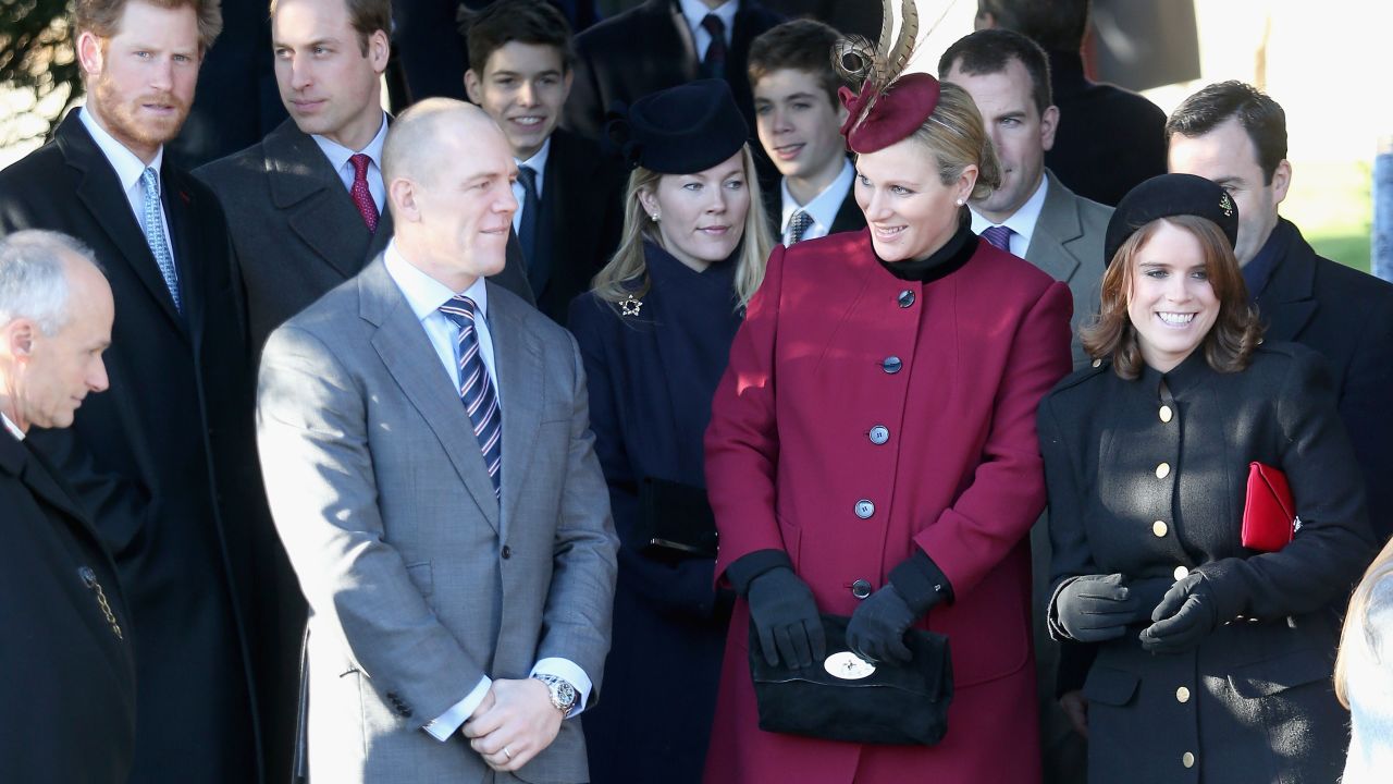 Zara  and Mike Tindall leave the Christmas Day service at Sandringham on December 25, 2013 in King's Lynn, England.