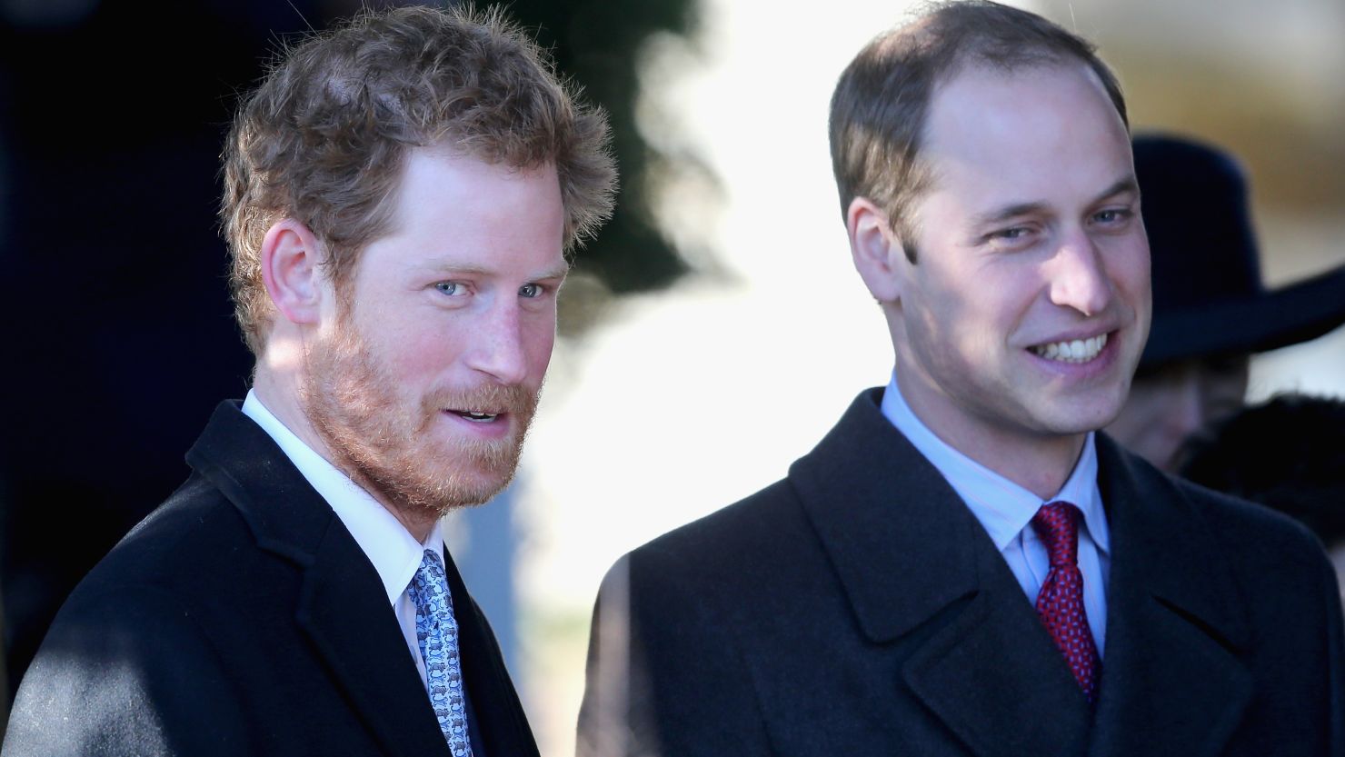 Prince Harry, left, and Prince William leave the Christmas Day service at Sandringham on December 25 in King's Lynn.