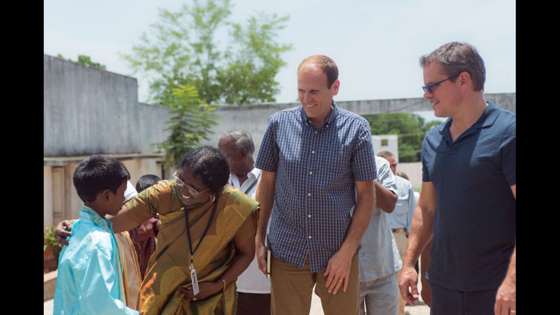 White, left, and Damon visit students and teachers at BWDA Middle School in Kolliyangunam, a village near Chennai, India. Hygiene education programs at this school have reduced the number of sick days for students and encouraged families to improve their sanitation facilities.