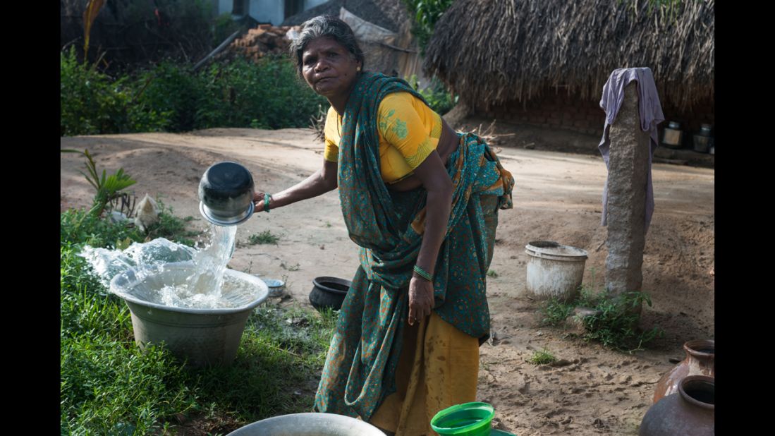 A woman in Vilupuram, India, washes pots and pans at her new water point. With safe water at her home, she no longer has to make daily trips to the river. Matt Damon and Gary White co-founded <a href="http://water.org/" target="_blank" target="_blank">Water.org</a>, a nonprofit that helps communities achieve sustainable water systems. Click through to see the work they are doing throughout the world: 