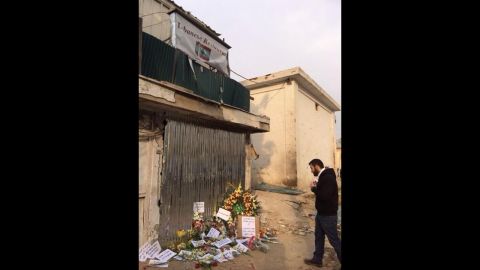 Mourners left flowers outside the beloved Kabul restaurant after the attack.
