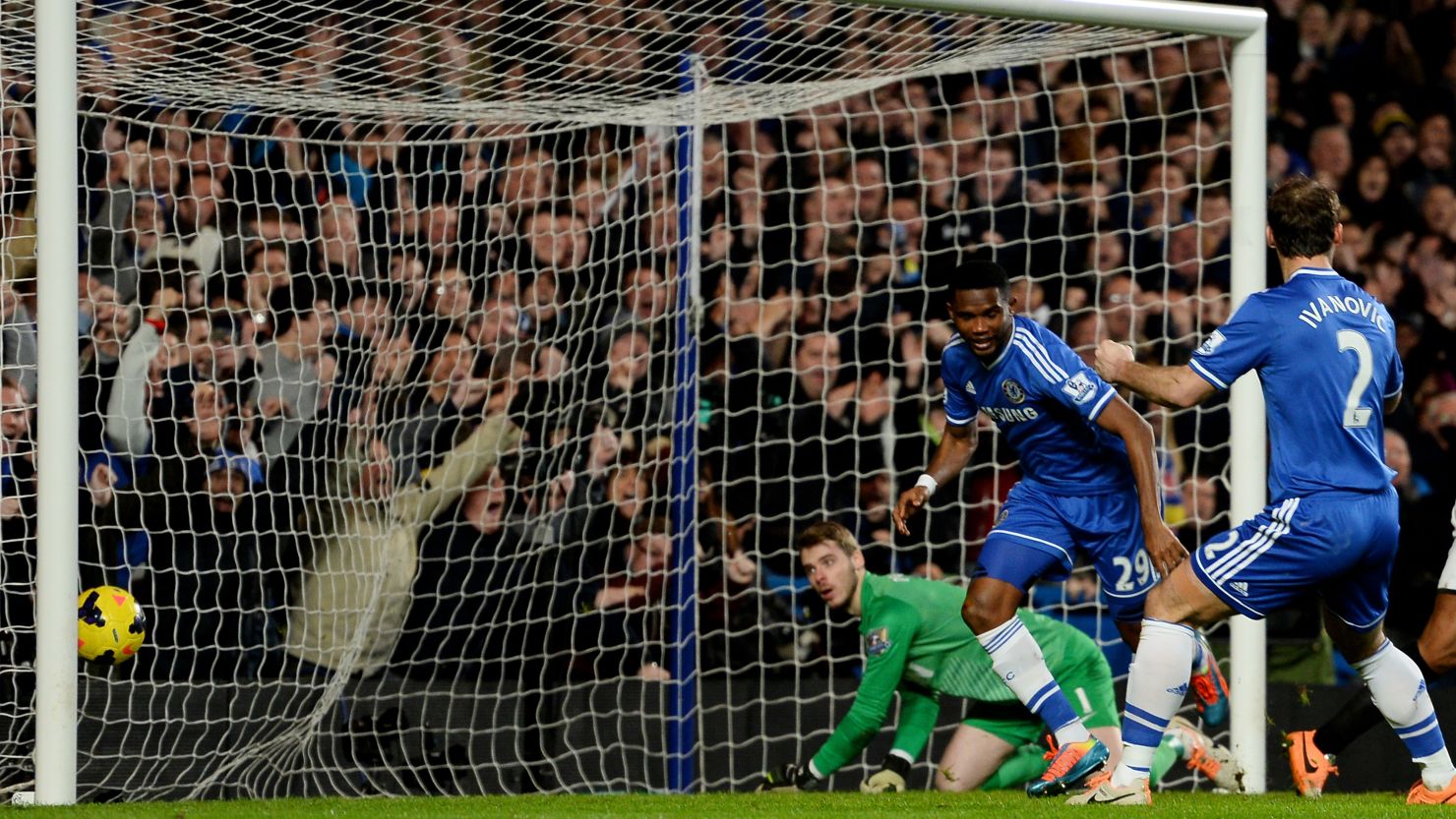 Samuel Eto'o (center) celebrates with Branislav Ivanovic after completing his hat trick for Chelsea against Manchester United