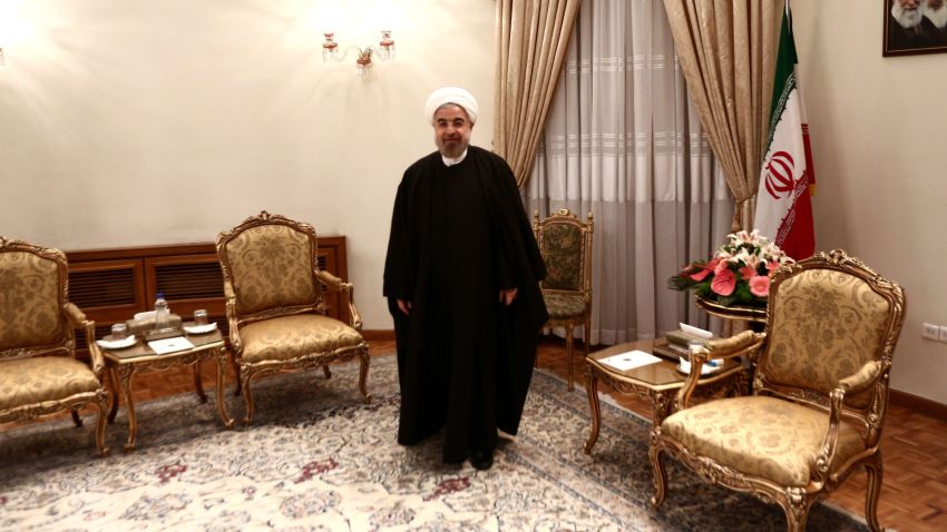 Iranian President Hassan Rouhani waits to meet with Russian Foreign Minister in Tehran on December 11, 2013.