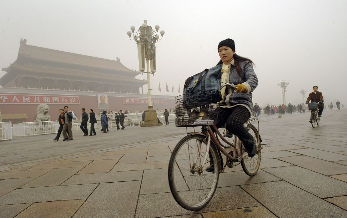 Bikers in Beijing have gotten used to the smog. That doesn't mean they like it. 