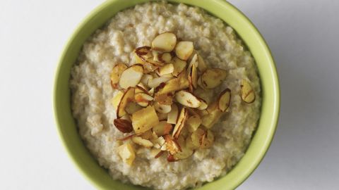 <strong>Oatmeal</strong><br /><br /><a href="http://www.health.com/health/gallery/0,,20306673,00.html" target="_blank" target="_blank">Oatmeal</a>'s filling force comes from its high fiber content and its uncanny ability to soak up liquid like a sponge. When cooked with water or skim milk, the oats thicken and take more time to pass through your digestive system, meaning you'll go longer between hunger pangs.<br /><br /><strong>Feel even fuller:</strong> Sprinkle almonds on top of your bowl. "The nuts pack protein and fiber and contain unsaturated fats that can help stabilize insulin levels," regulating blood sugar, Katz says.<br /><br /><a href="http://www.health.com/health/gallery/0,,20735735,00.html" target="_blank" target="_blank">Health.com: 13 comfort foods that burn fat</a> 