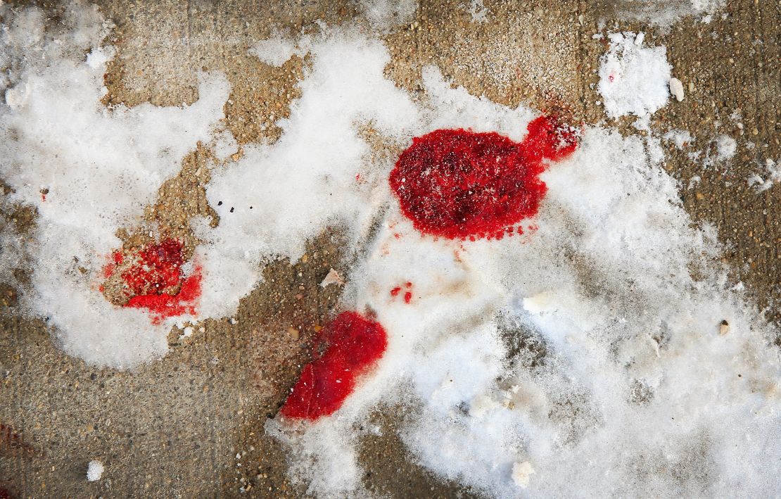 Blood is frozen in snow in Chicago's Logan Square neighborhood after a 68-year-old man was shot to death.