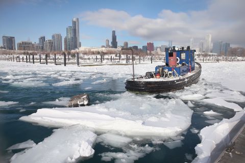 The tugboat Commissioner breaks up ice in Chicago's Burnham Harbor on January 21.