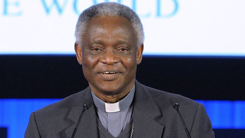 Ghanaian Cardinal Peter Turkson reads to the audience a message sent by Pope Francis on the eve of the opening of the forum in Davos on January 21, 2014. Some 40 world leaders gather in the Swiss ski resort Davos to discuss and debate a wide range of issues including the causes of conflicts plaguing the Middle East and how to reinvigorate the global economy. AFP PHOTO ERIC PIERMONTERIC PIERMONT/AFP/Getty Images