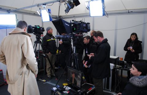 Quest talks to crew as he prepares for his first live broadcast from Davos, where the World Economic Forum is being held.