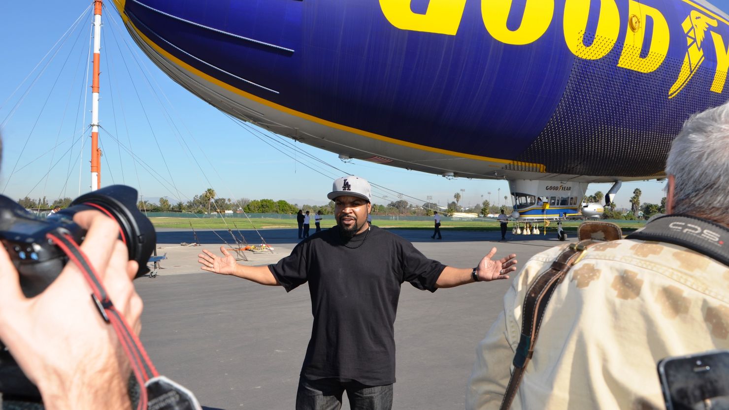 Ice Cube poses for photographers on Monday. 