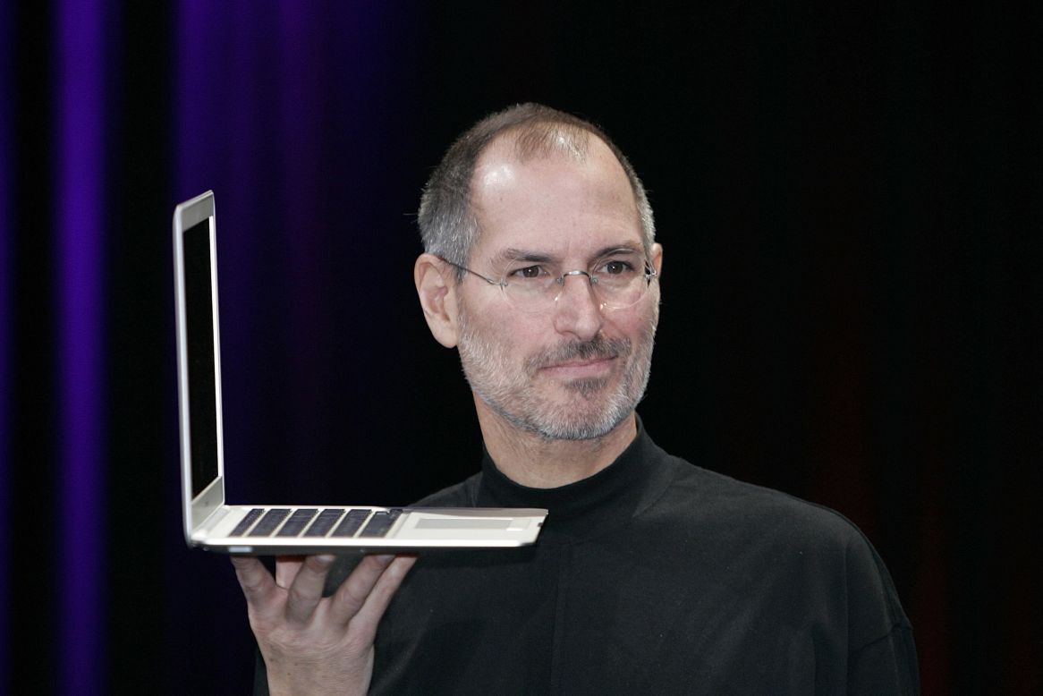 By the mid-2000s, Macs were increasingly laptops instead of desktops. Here Jobs holds up the new MacBook Air after a keynote speech kicking off the 2008 Macworld conference in San Francisco. 