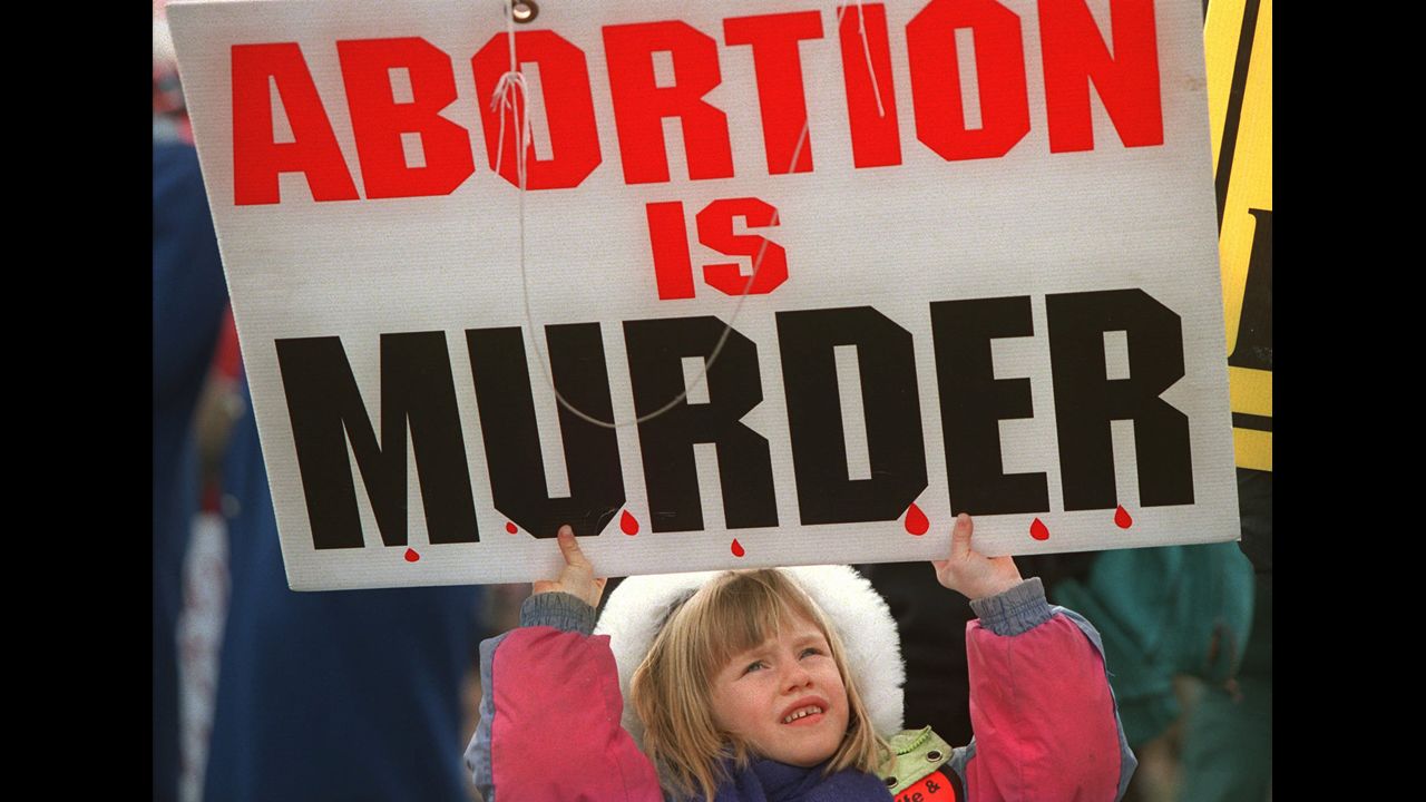 Leah Maher, 5, holds a sign during the March for Life rally on the Ellipse in Washington on January 22, 1997. Organizers estimate that at least 50% of the marchers are younger than 18, as busloads of Catholic students descend on the capital from across the country.