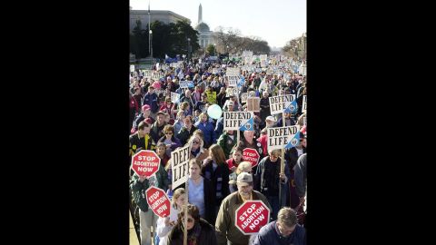 Activists march on Constitution Avenue in Washington on January 22, 2002. Estimates of the crowd's size vary, but it seems safe to say tens of thousands have attended the annual protest.