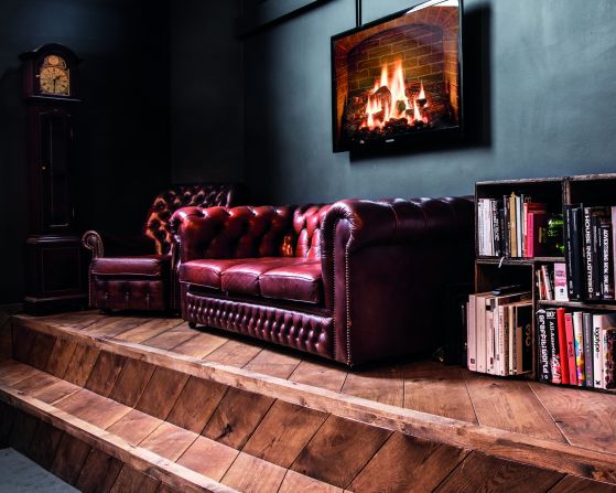 This digital advertising agency oozes Old World chic in order to contrast with its rivals, who tend to favor a sleek, steel aesthetic. The vintage leather sofa hints at the firm's focus on bespoke campaigns, while a digital fireplace adds a bit of whimsy. 