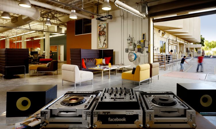 For Facebook's HQ architects renovated an abandoned tech lab in the Stanford Research Park. The open floor plan is meant to invoke a shared living space. Work and play mingle at every turn, as seen with these DJ turntables, which are used during dance parties. 