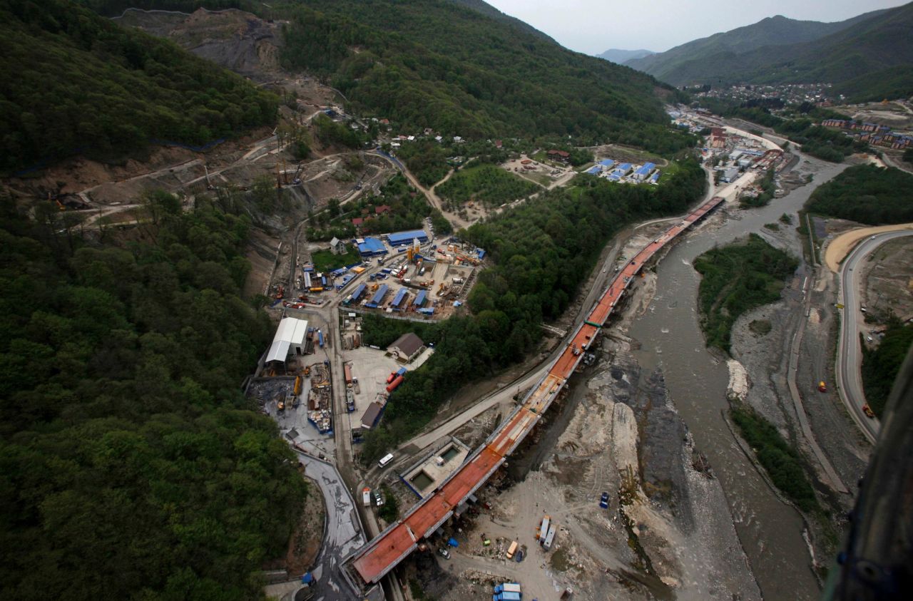 Pictured here from the Krasnaya Polyana ski resort is the combined motor and rail road that runs between Olympic sites.  