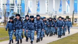 About 37,000 security officers will be deployed for the Sochi Games. Police officers walk in front of the main press center at the Olympic Park in Sochi on January 7, 2014.
