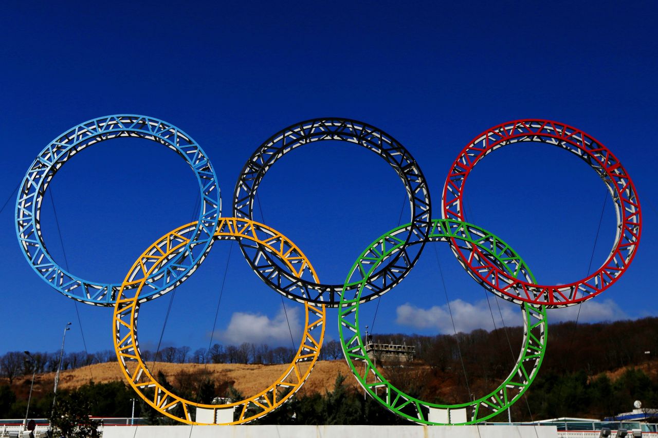 The Olympic rings light up the sky outside Sochi International Airport. An estimated 3 billion people are expected to watch the Olympics on television.