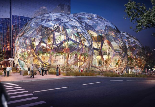 <a href="http://www.nbbj.com/work/amazon/" target="_blank" target="_blank">NBBJ</a>, the architecture firm behind Amazon's new Seattle offices, say their goal is to "build a neighborhood rather than a campus." Around 1800 employees will eventually work inside three glass orbs, each of which will boast hanging gardens and plenty of sunlight. The community-focused design also calls for a public dog park and retail space. 